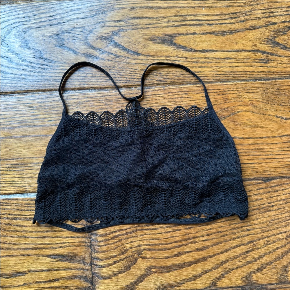 Free People like (no sure who actually makes it) Black Lace Crop Top